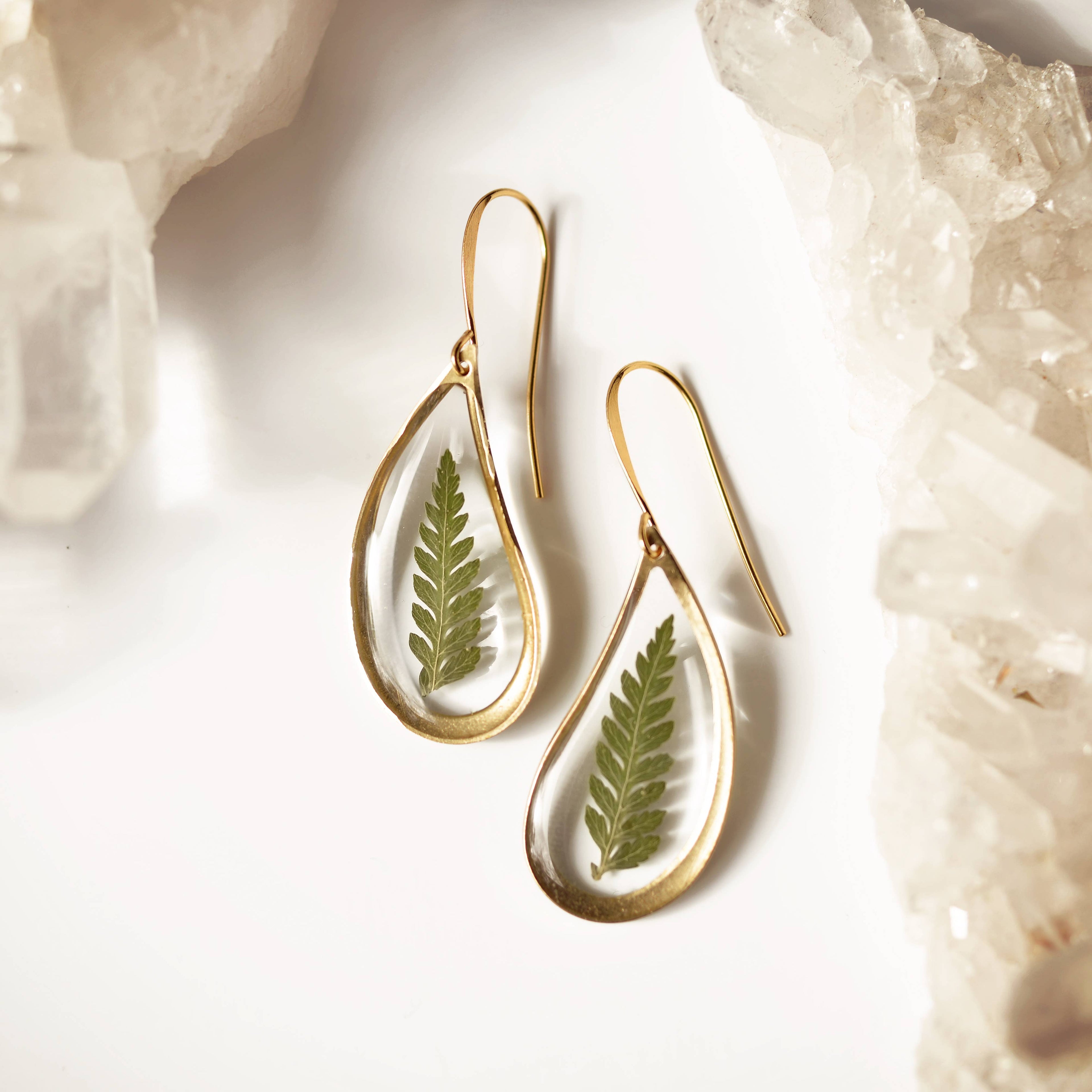 Handmade, hand pressed fern teardrop earrings from a real fern made in resin. Gold plated earring hooks. 